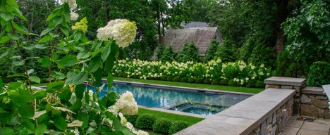 poolside garden and stone wall outdoor space