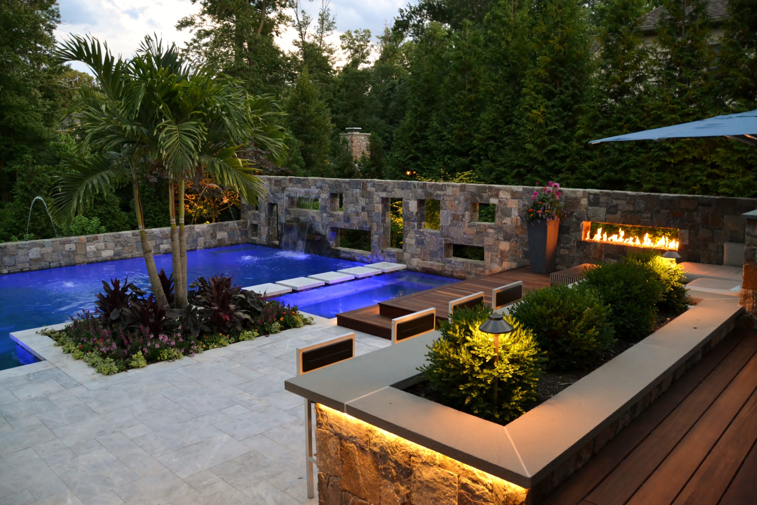 outdoor lighting around pool and bar area